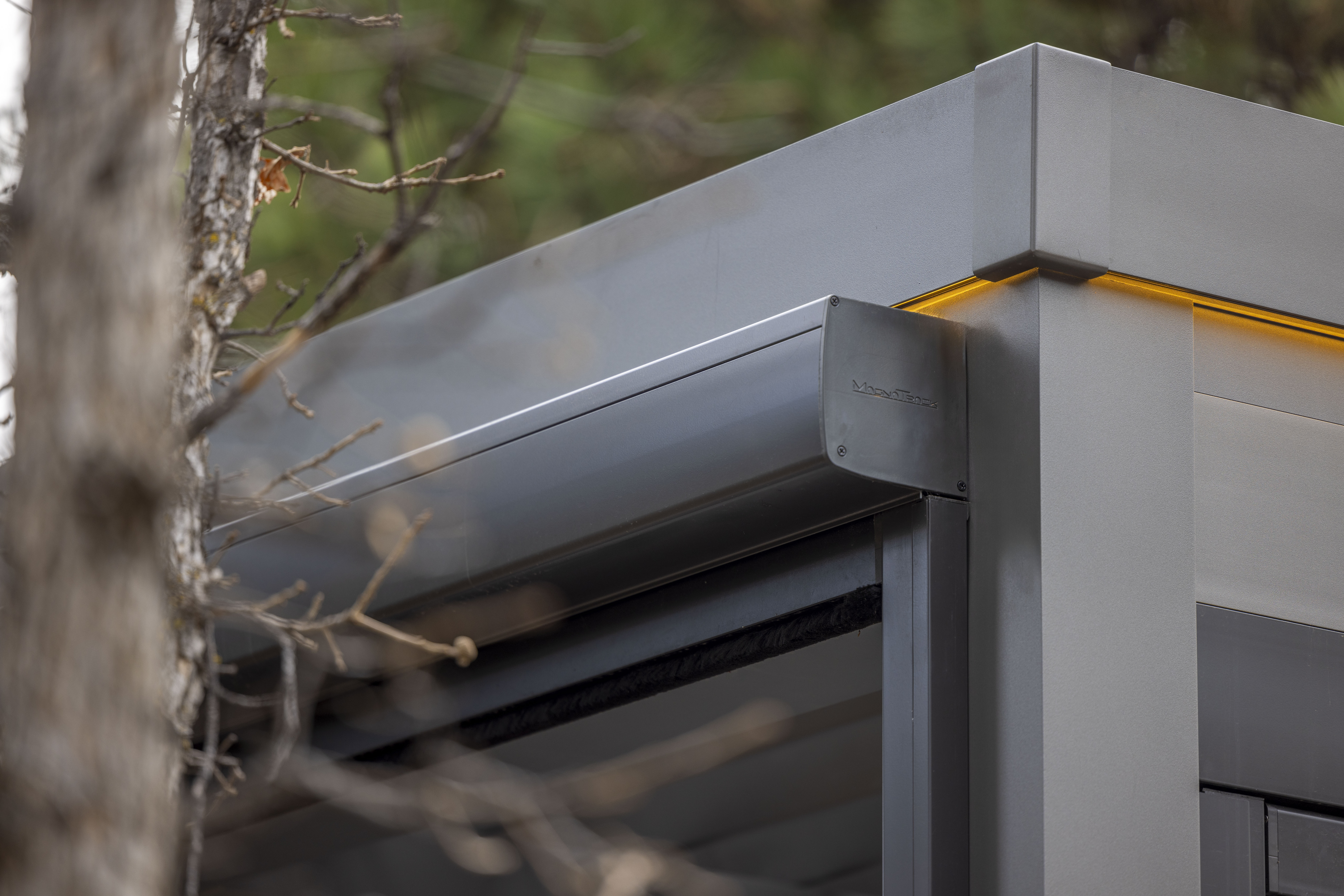 White powder-coated aluminum pergola with outdoor kitchen